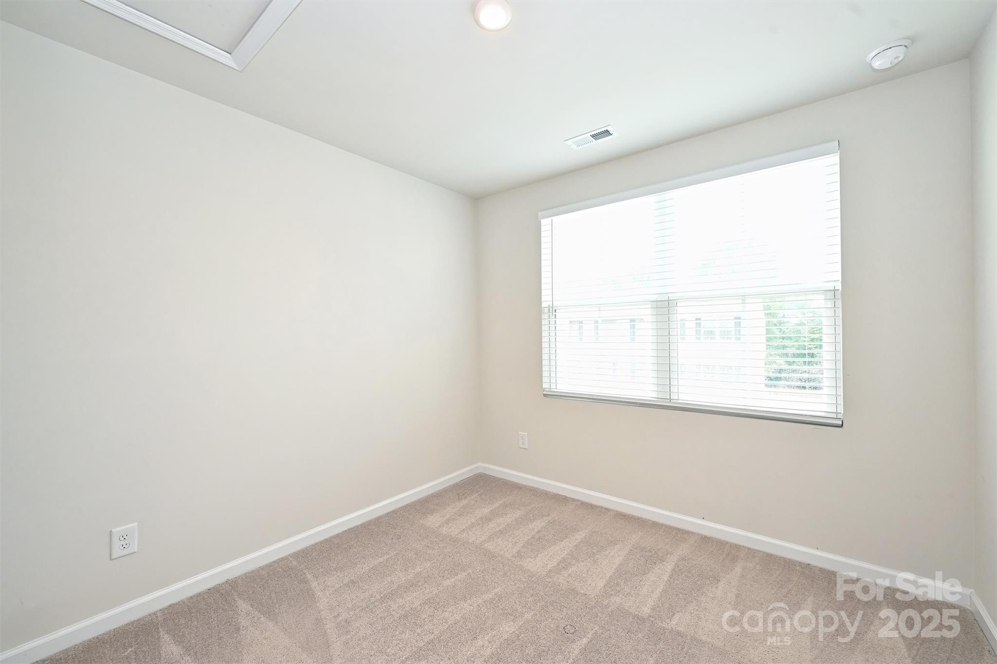 825 Renee Avenue Fort Mill, SC 29715 - Photo 25 of 30 an empty room with a window