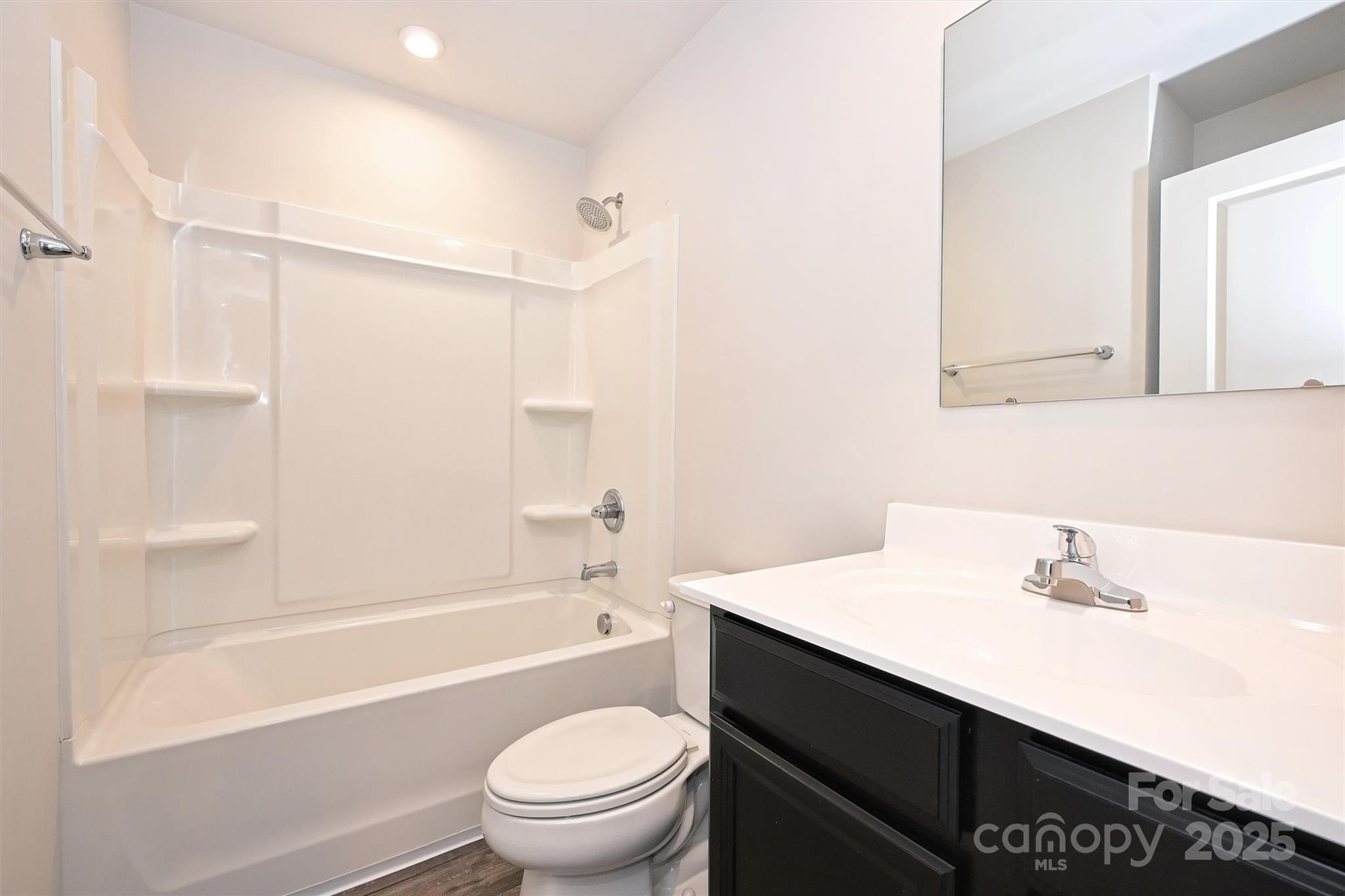 825 Renee Avenue Fort Mill, SC 29715 - Photo 27 of 30 a bathroom with a sink a toilet and shower