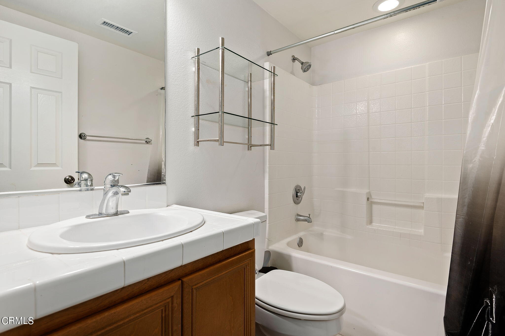 2824 Yacht Way Oxnard, CA 93035 - Photo 13 of 24 a bathroom with a sink a toilet and a bathtub