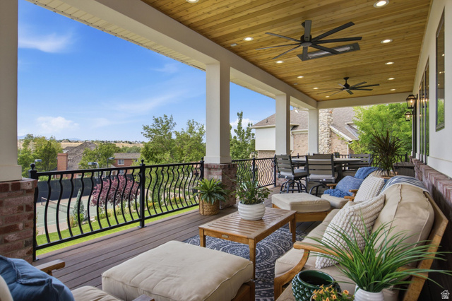 12308 Mariah Circle Draper, UT 84020 - Photo 228 of 293 Guest House Expansive covered patio featuring a wood-finish plank ceiling with recessed lighting and ceiling fans