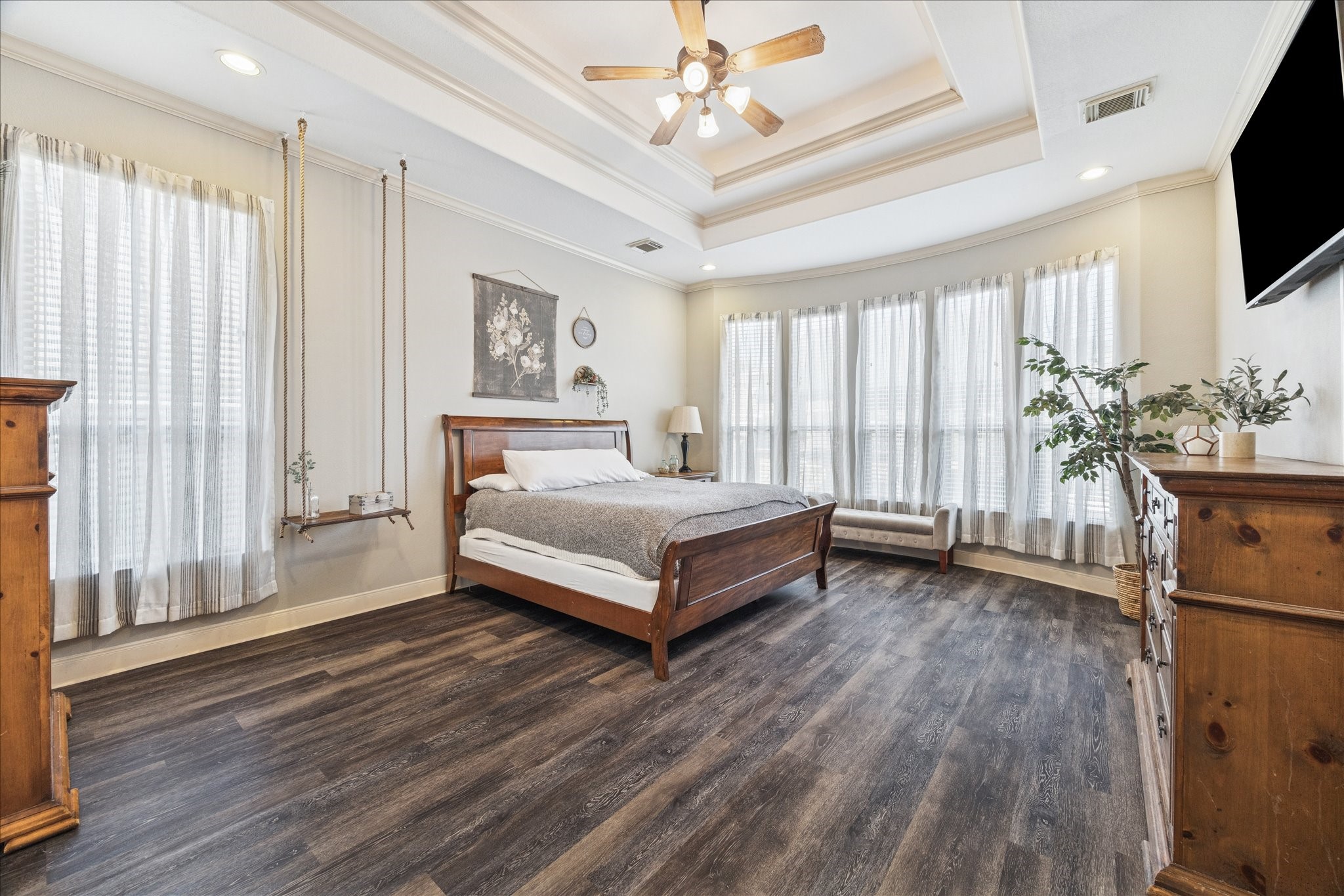 31030 North Imperial Path Lane Spring, TX 77386 - Photo 16 of 38 a spacious bedroom with a bed and a flat screen tv