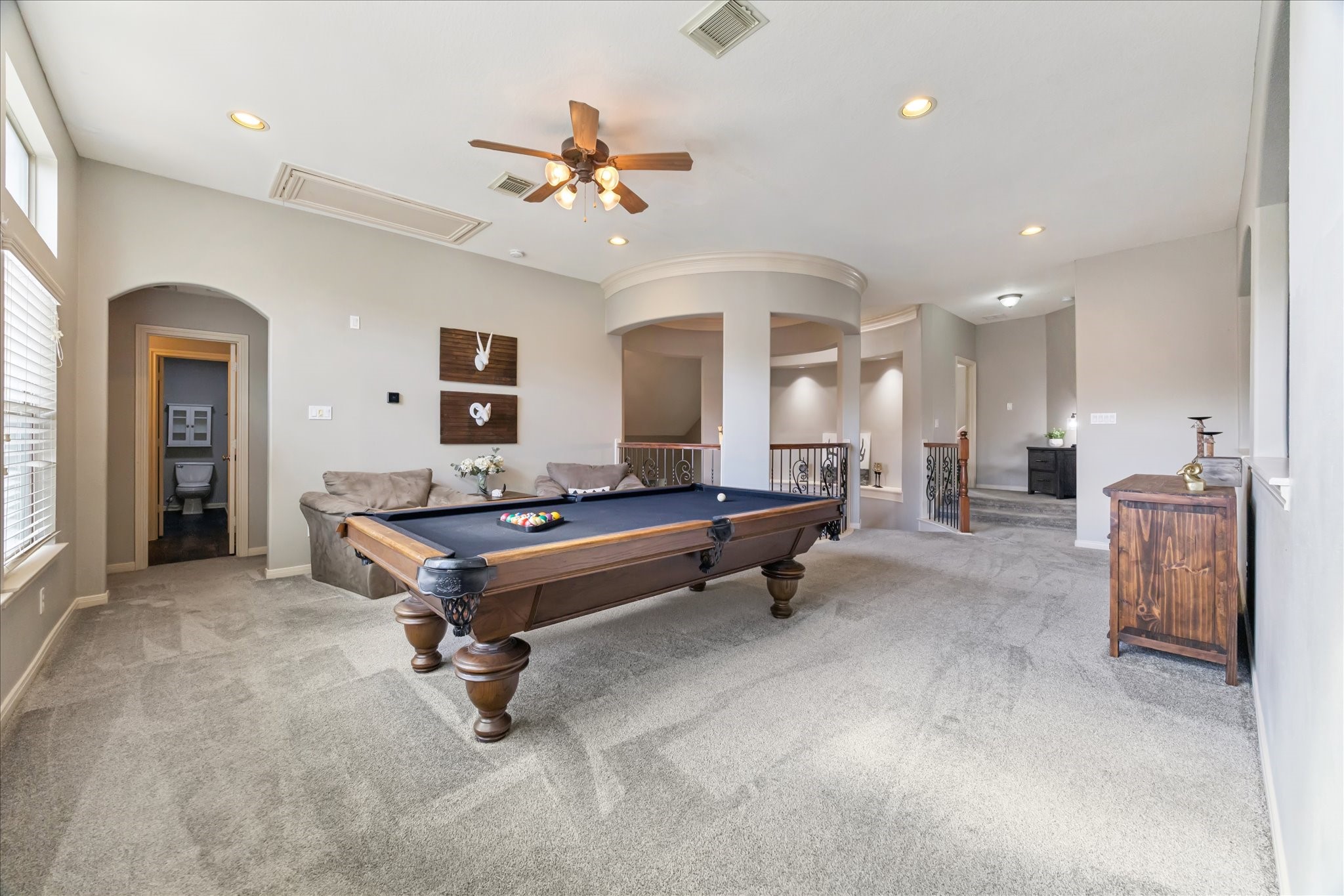 31030 North Imperial Path Lane Spring, TX 77386 - Photo 22 of 38 a living room with furniture and a chandelier