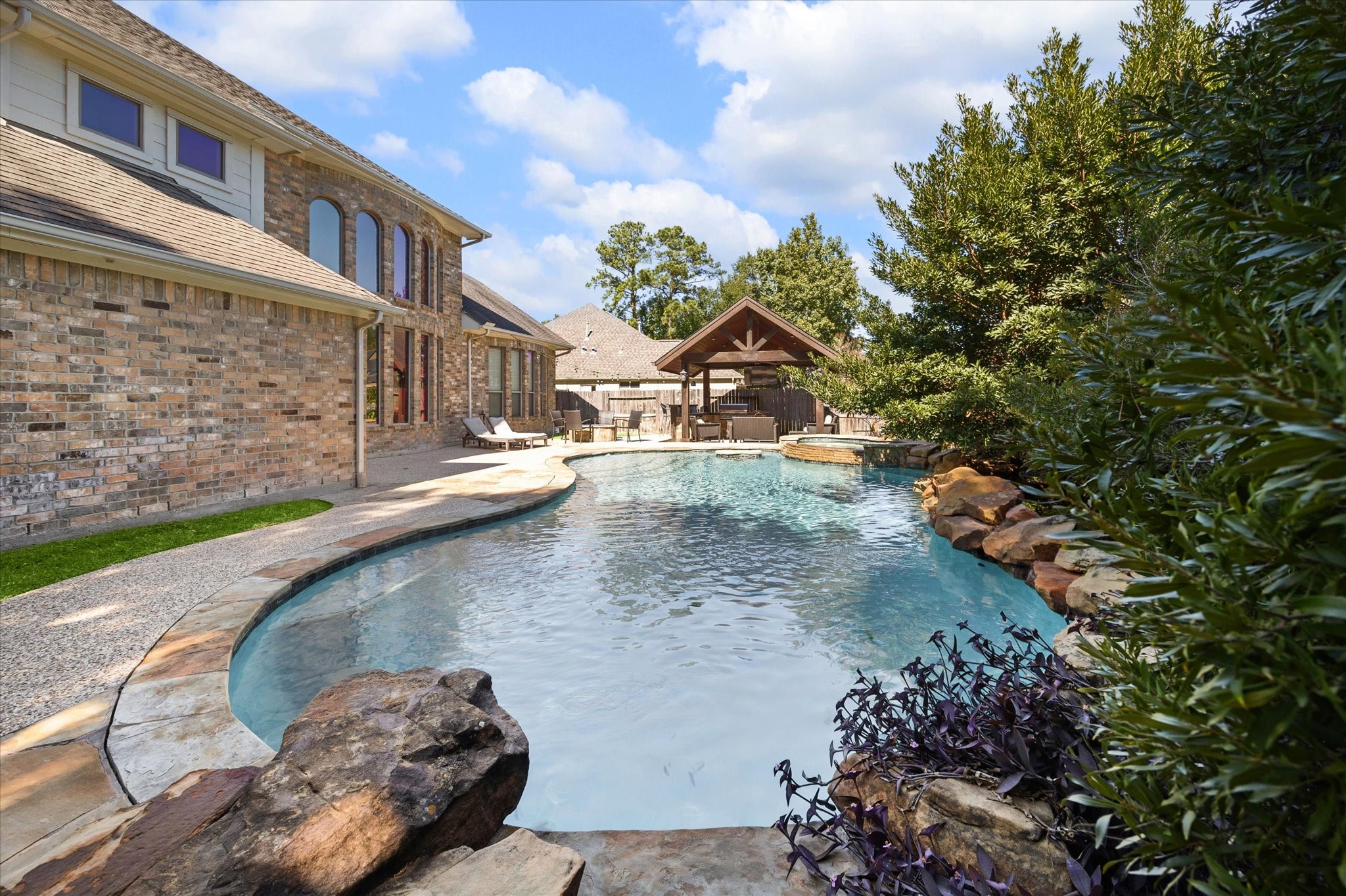 31030 North Imperial Path Lane Spring, TX 77386 - Photo 31 of 38 a view of a house with a yard