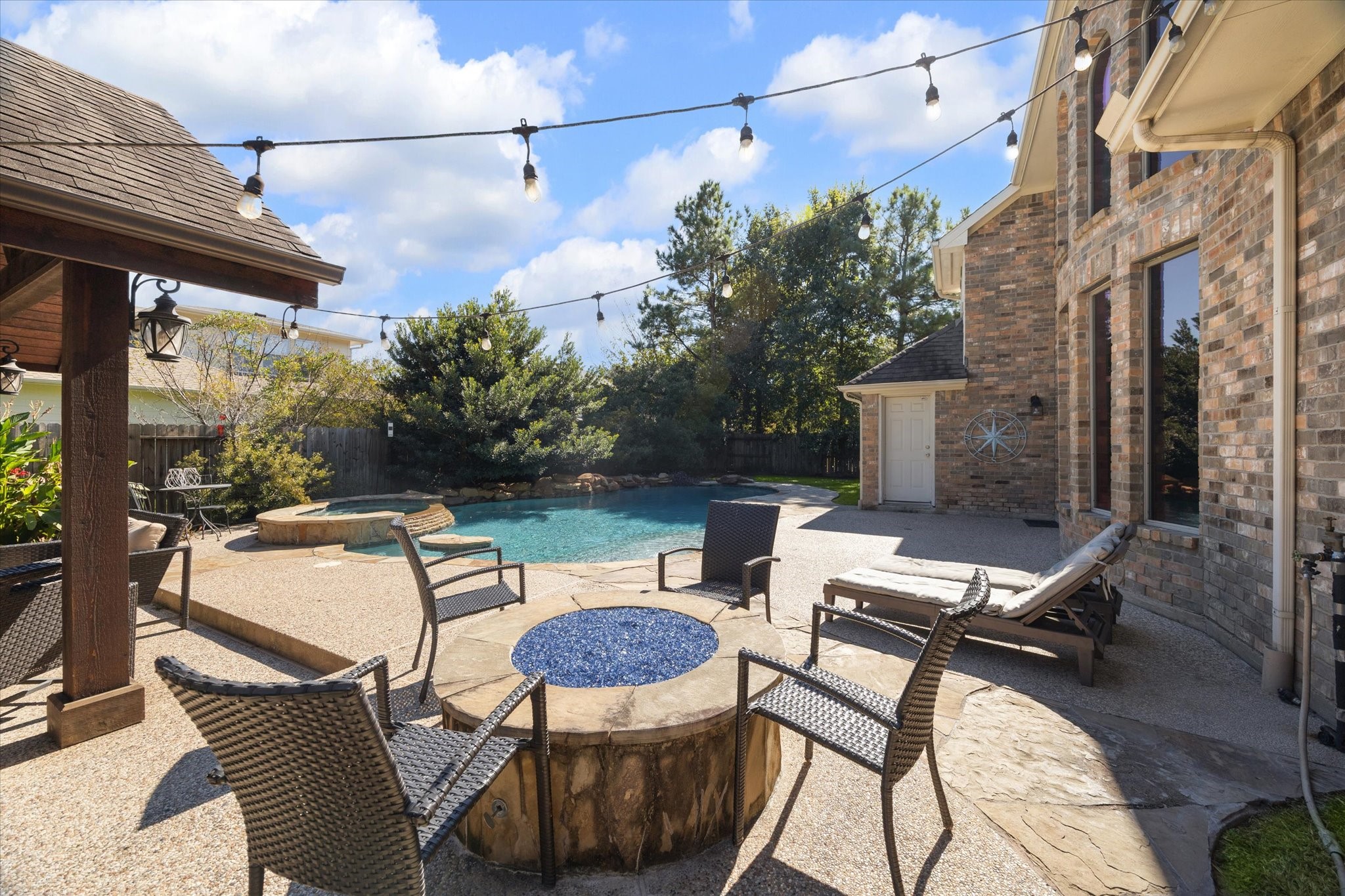31030 North Imperial Path Lane Spring, TX 77386 - Photo 32 of 38 a patio with a yard table and chairs