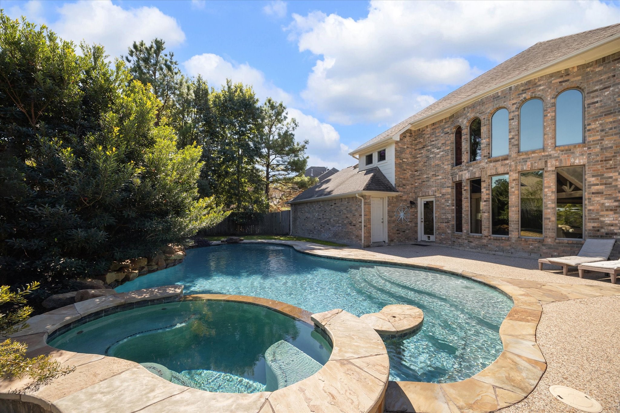 31030 North Imperial Path Lane Spring, TX 77386 - Photo 4 of 38 a view of swimming pool with seating space