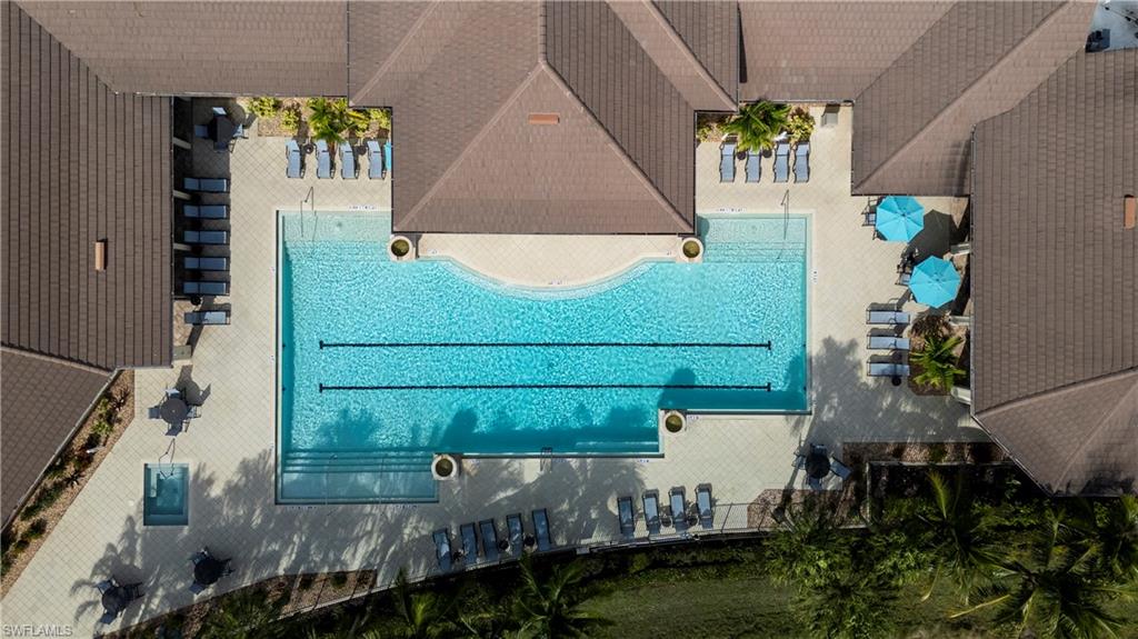 2373 Anguilla Drive, Unit 101 Naples, FL 34120 - Photo 26 of 32 an aerial view of a house with a yard