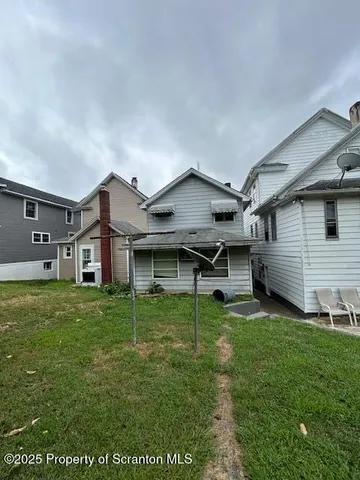 a house view with a outdoor space