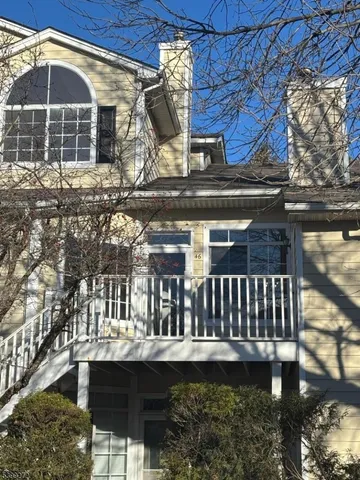 a view of balcony with a deck