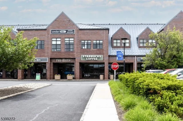 a view of a building with a garden