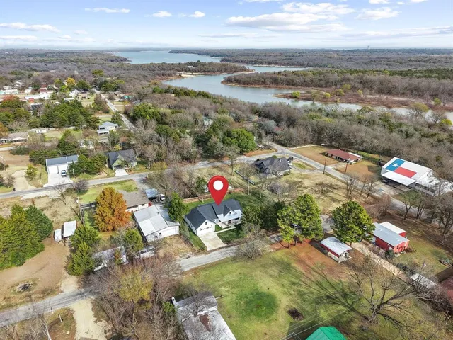 a view of a house with a big yard