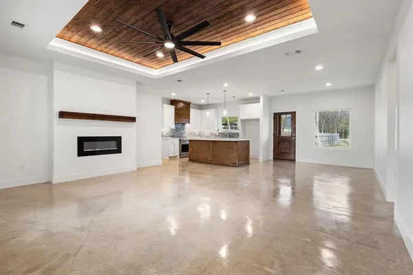 a view of a kitchen with a stove cabinets and a kitchen