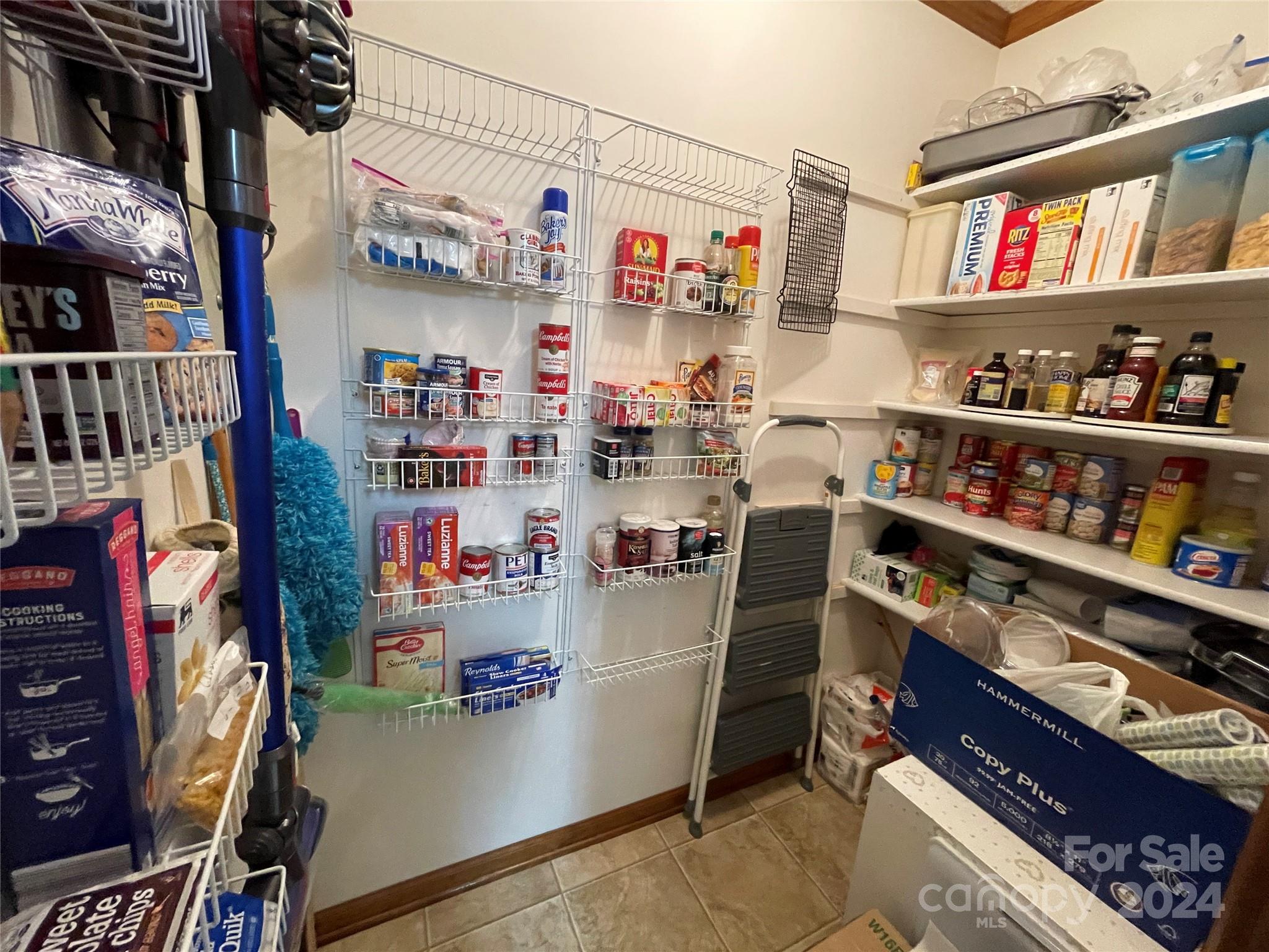 36345 Old Salisbury Road New London, NC 28127 - Photo 11 of 48 a room with storage and a white refrigerator