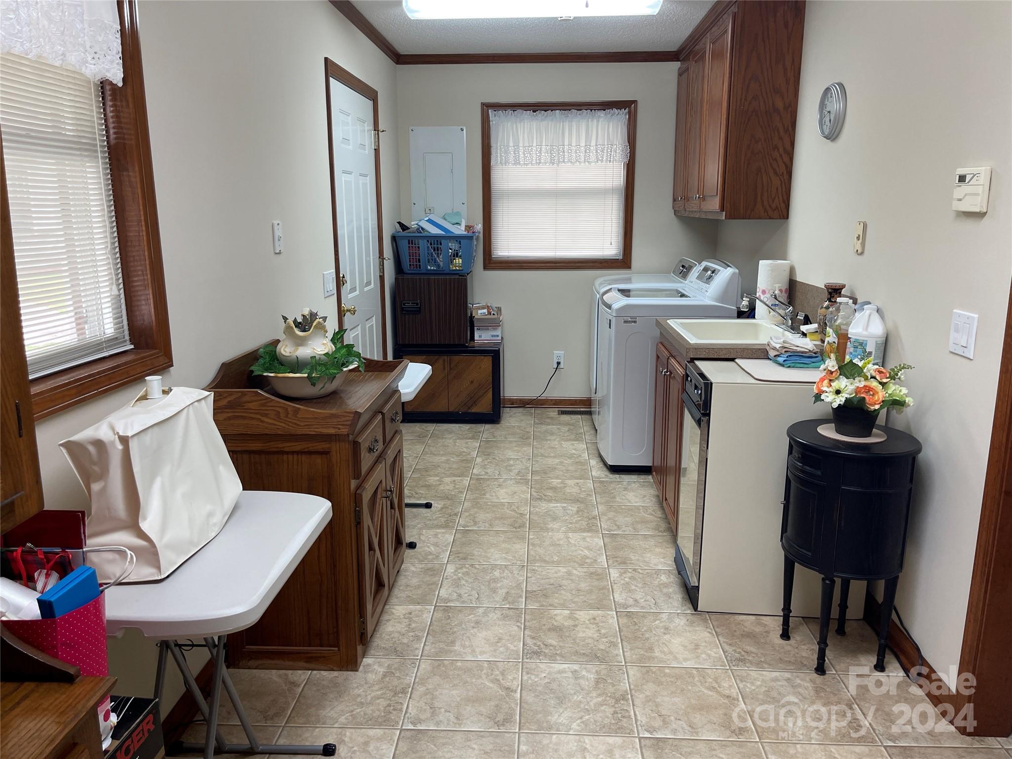 36345 Old Salisbury Road New London, NC 28127 - Photo 12 of 48 a living room with furniture a rug and a window