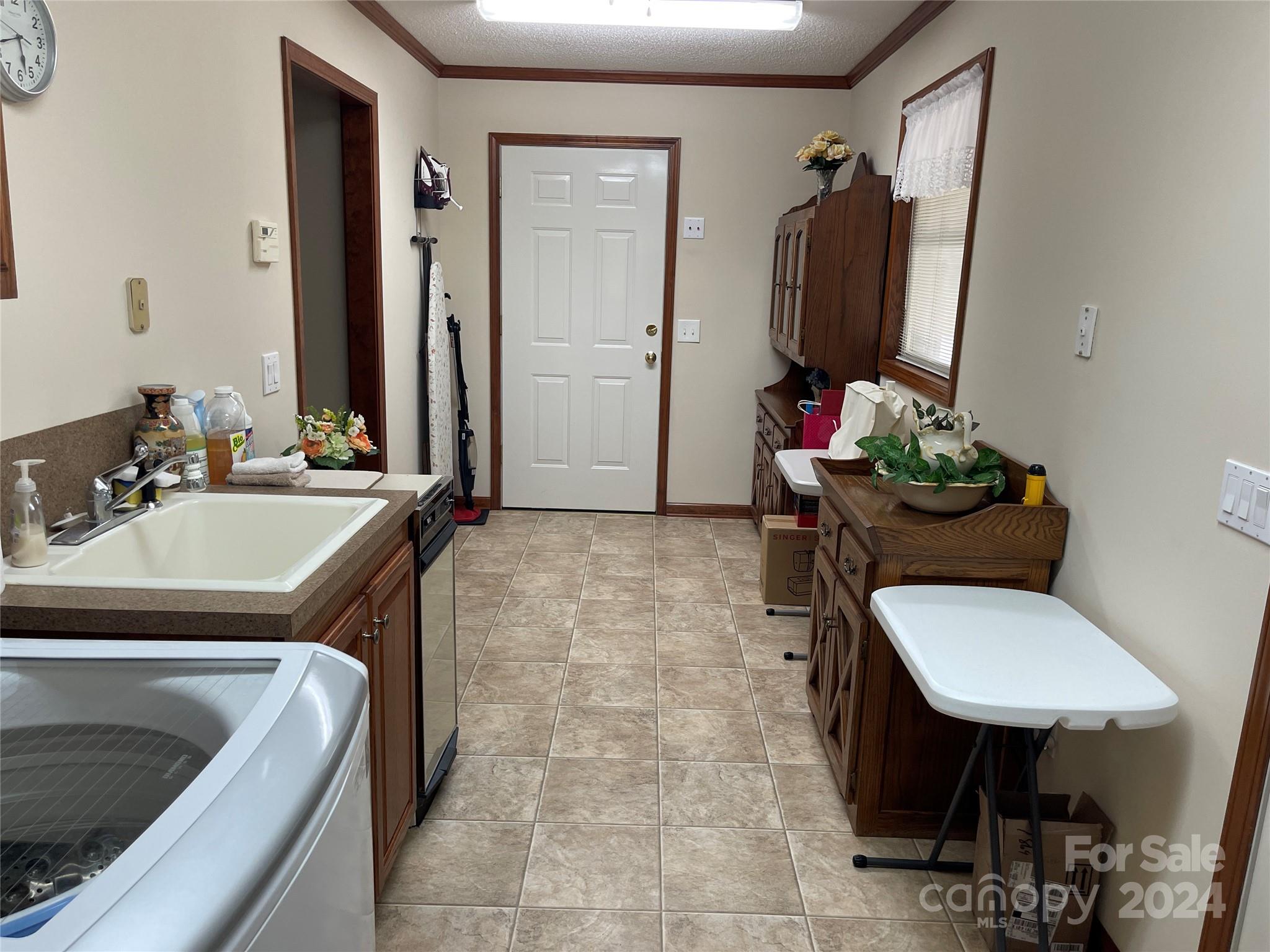 36345 Old Salisbury Road New London, NC 28127 - Photo 13 of 48 a bathroom with a sink a toilet and a mirror