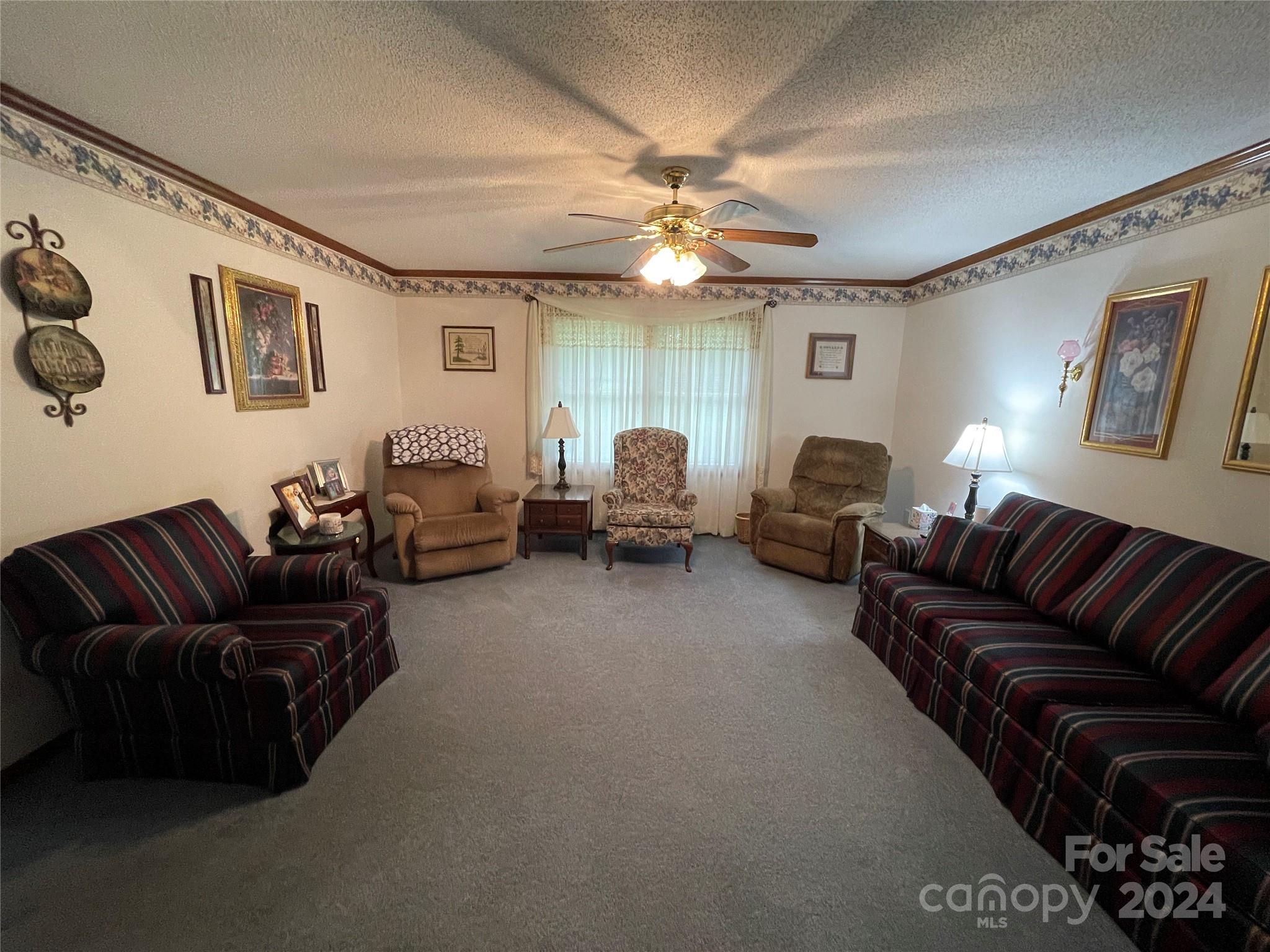 36345 Old Salisbury Road New London, NC 28127 - Photo 15 of 48 a living room with furniture