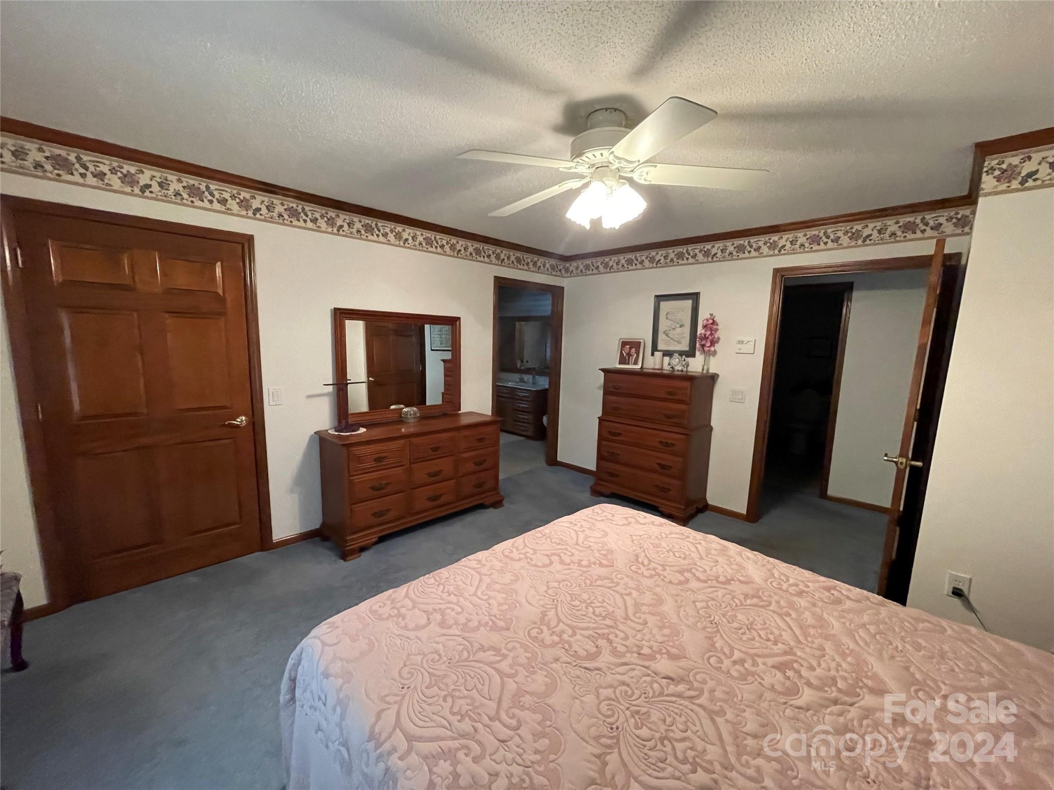 36345 Old Salisbury Road New London, NC 28127 - Photo 20 of 48 a bedroom with a bed and furniture