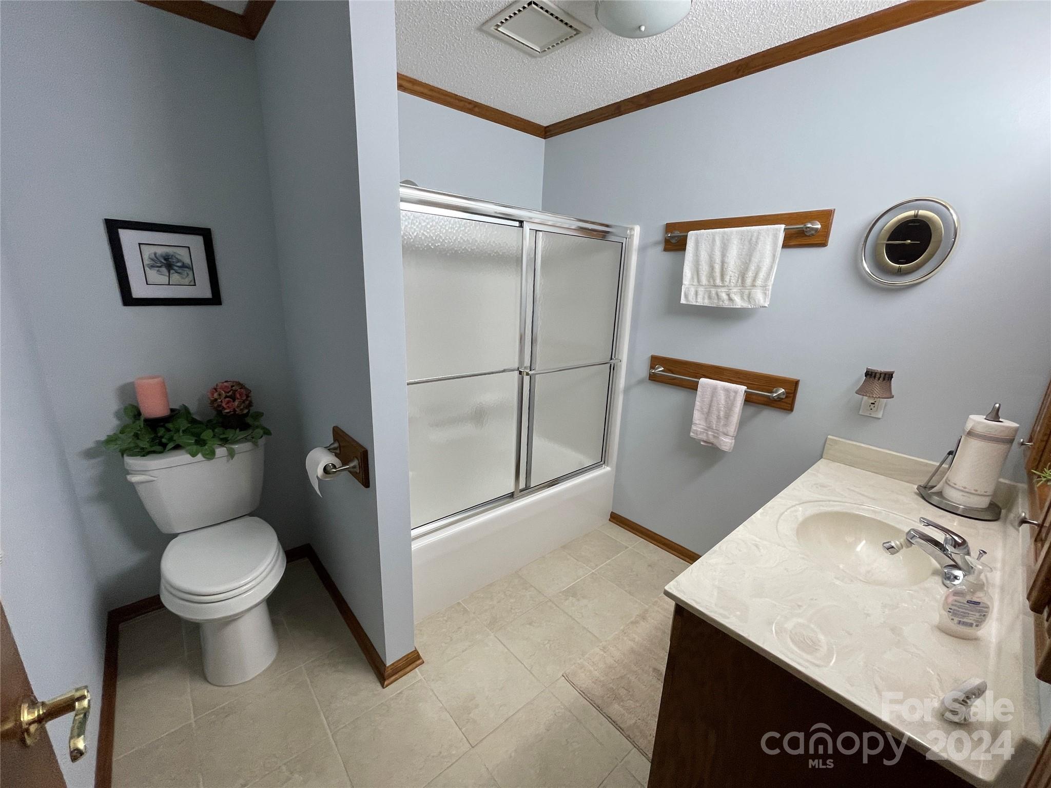 36345 Old Salisbury Road New London, NC 28127 - Photo 34 of 48 a bathroom with a sink toilet and shower