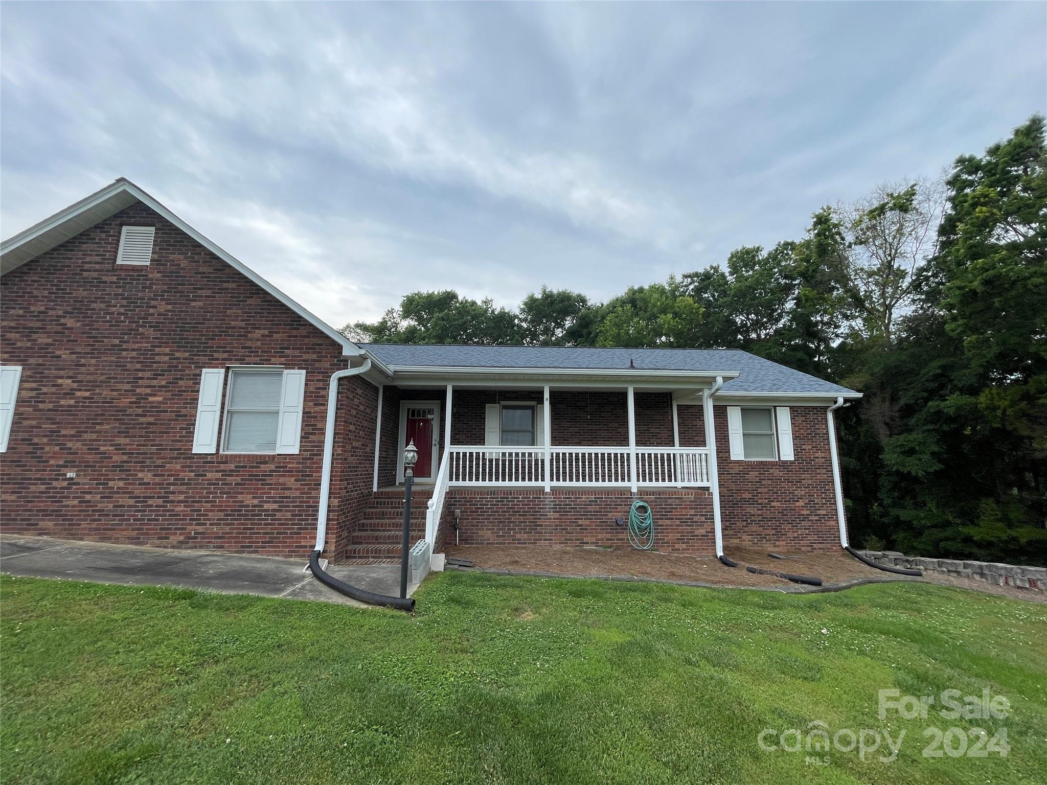 36345 Old Salisbury Road New London, NC 28127 - Photo 43 of 48 a view of a house with a yard