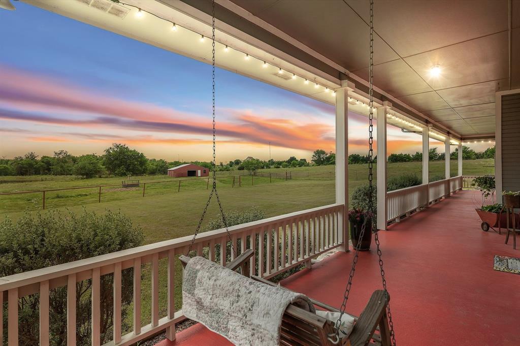 707 Cullins Road Rockwall, TX 75032 - Photo 3 of 40 a view of a two chairs in the balcony