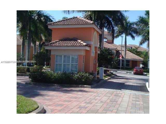 Davie Davie, FL 33314 - Photo 2 of 11 a view of a house with a yard and potted plants