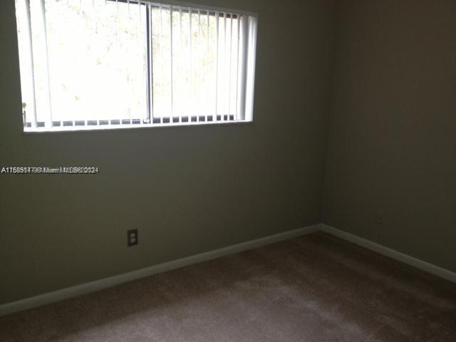 Davie Davie, FL 33314 - Photo 7 of 11 an empty room with a window