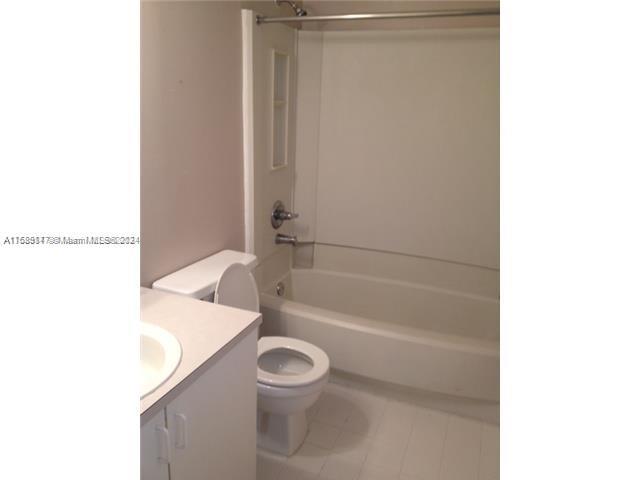 Davie Davie, FL 33314 - Photo 8 of 11 a bathroom with a granite countertop bathtub shower and sink