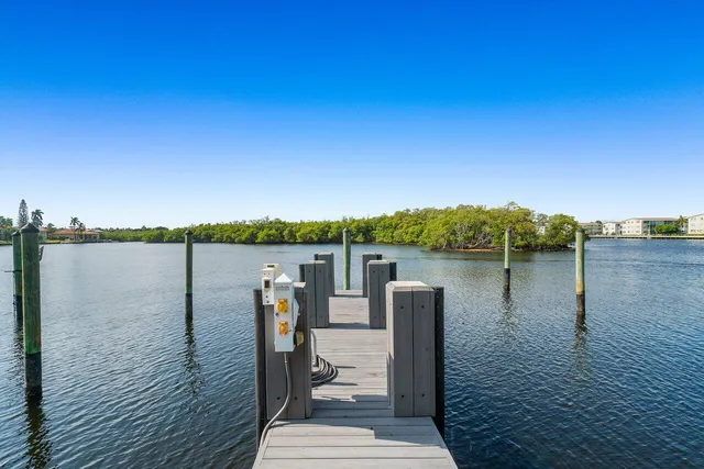 a view of a lake with sitting area