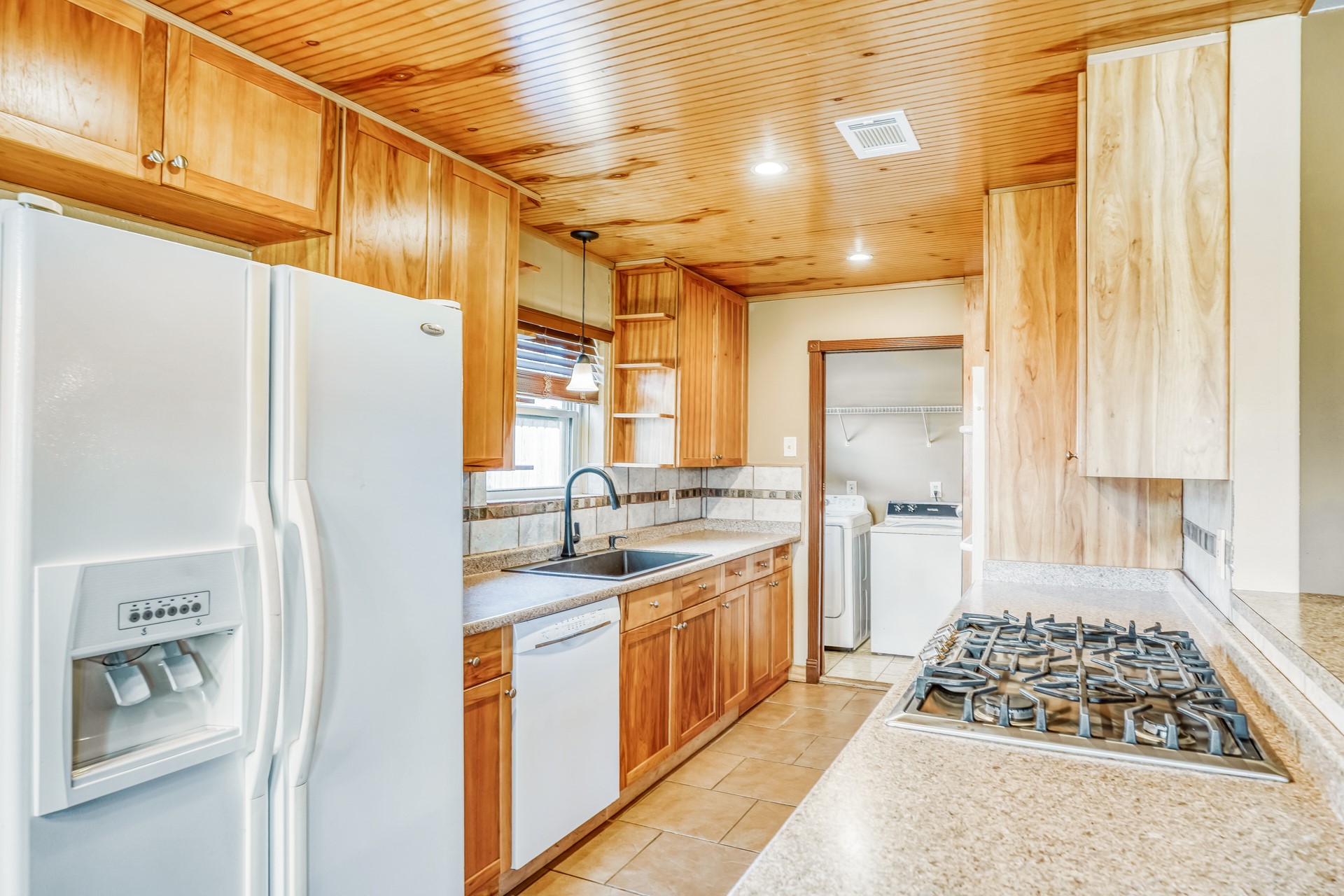 21611 Glenbranch Drive Spring, TX 77388 - Photo 5 of 15 a kitchen with stainless steel appliances granite countertop a refrigerator and a stove