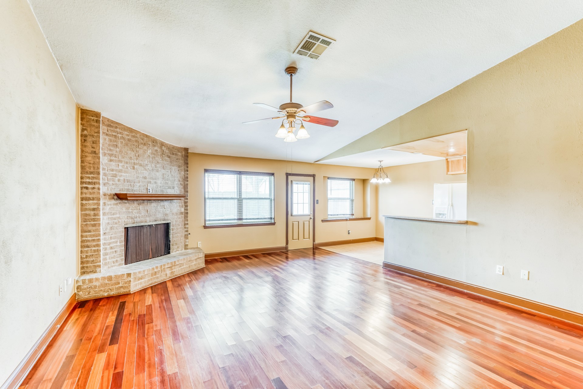 21611 Glenbranch Drive Spring, TX 77388 - Photo 6 of 15 a view of an empty room with a window and wooden floor