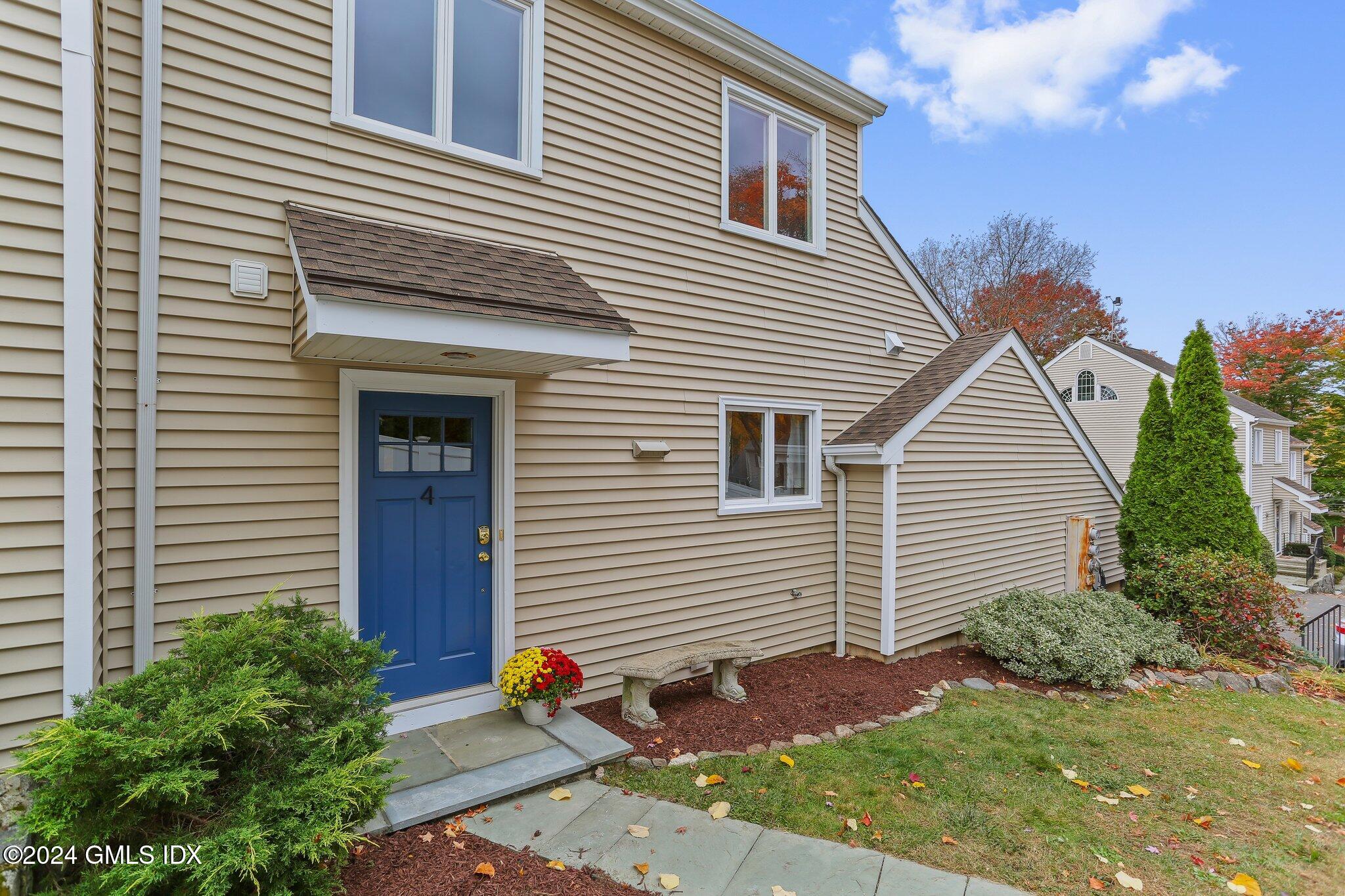 53 Bible Street, Unit 4 Cos Cob, CT 06807 - Photo 24 of 28 a view of backyard of house and garage