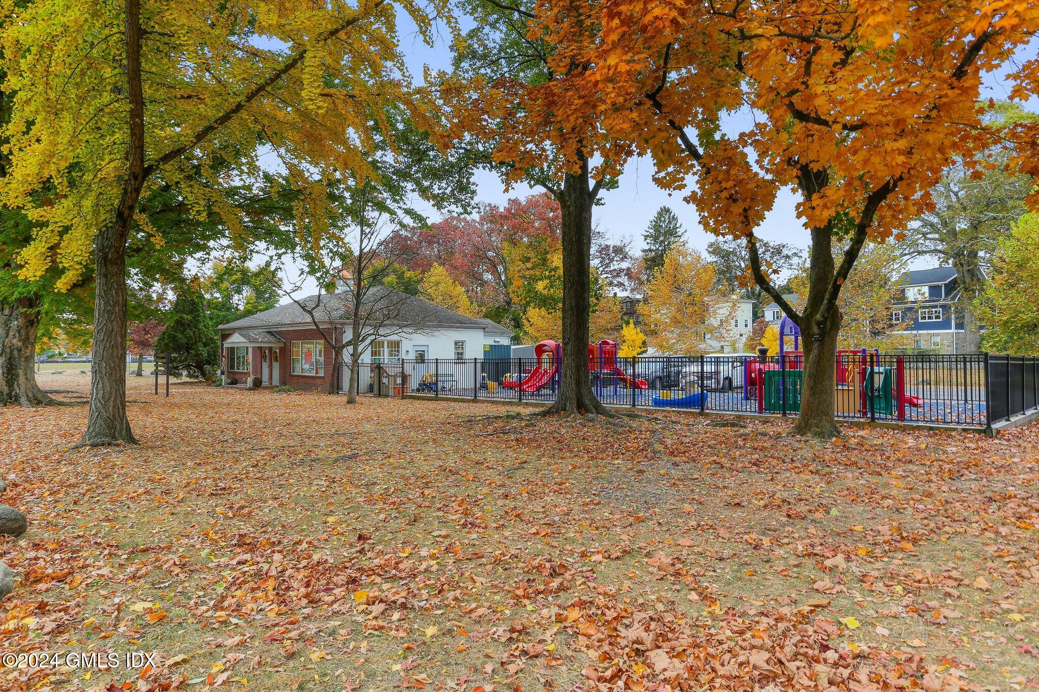 53 Bible Street, Unit 4 Cos Cob, CT 06807 - Photo 25 of 28 a view of a trees in front of a house