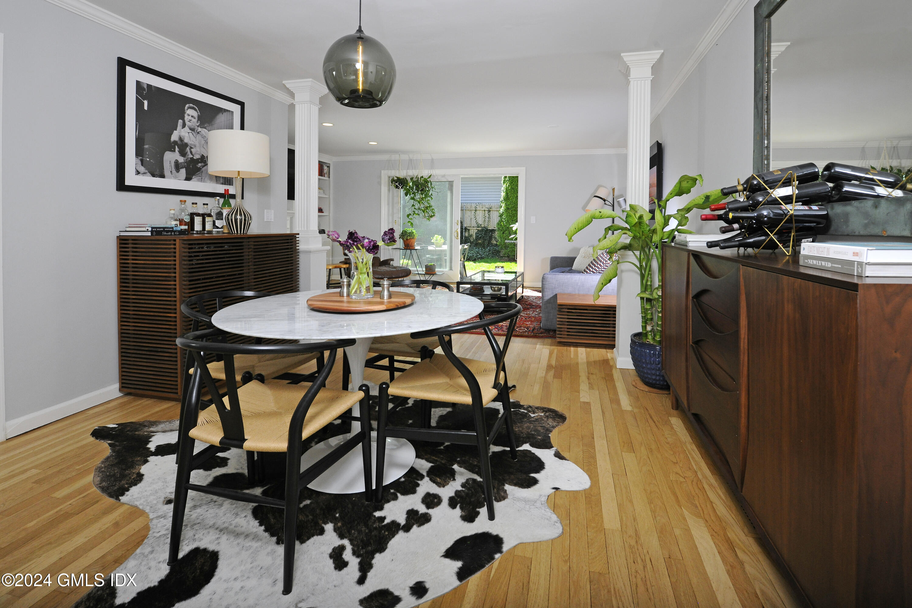 53 Bible Street, Unit 4 Cos Cob, CT 06807 - Photo 8 of 28 a view of a dining room with furniture and wooden floor