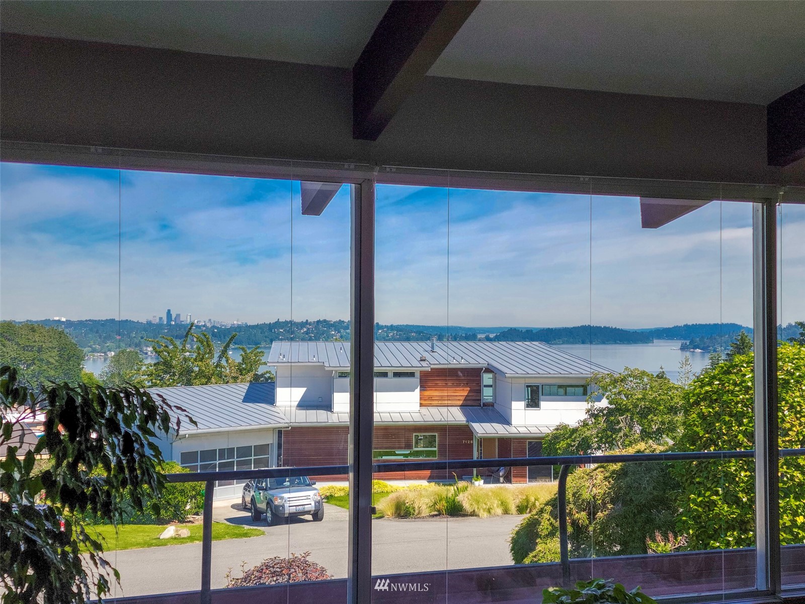 7133 South Sunnycrest Road Seattle, WA 98178 - Photo 8 of 39 a view of a balcony with lake view