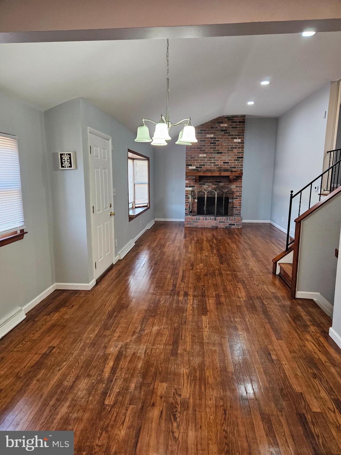 29 Malvern Road Newark, DE 19713 - Photo 4 of 14 a view of a room with wooden floor fireplace and window