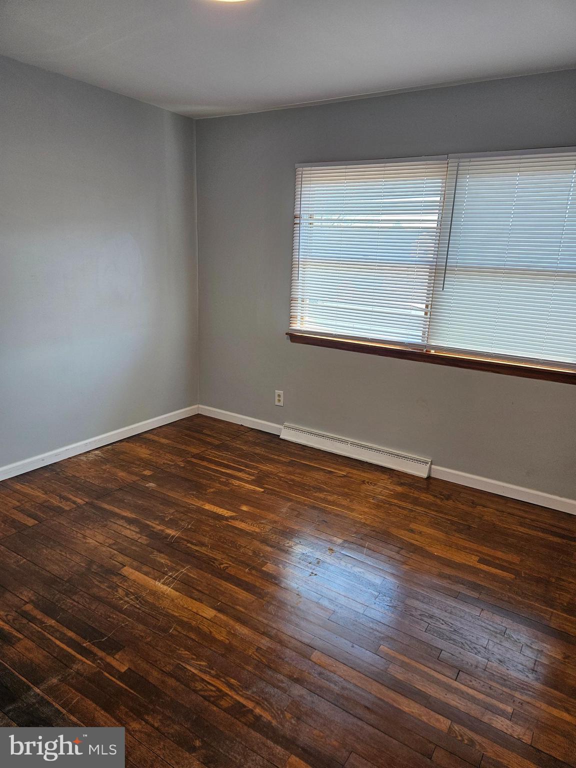 29 Malvern Road Newark, DE 19713 - Photo 7 of 14 a view of empty room with wooden floor and fan