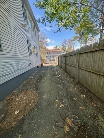 15-17 Otis Court, Unit 15 Springfield, MA 01119 - Photo 16 of 16 a view of a backyard