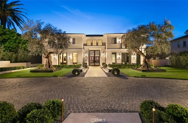 a view of a building with a yard