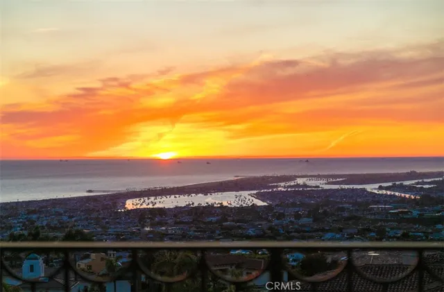 a large white kitchen with a large window