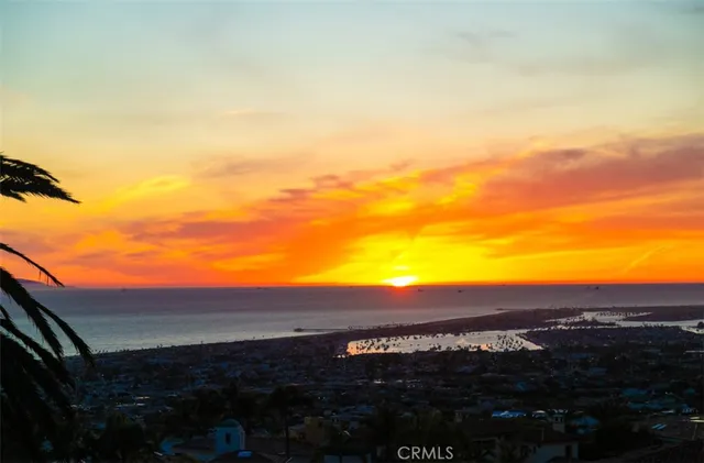 a living room with furniture gym equipment and a window