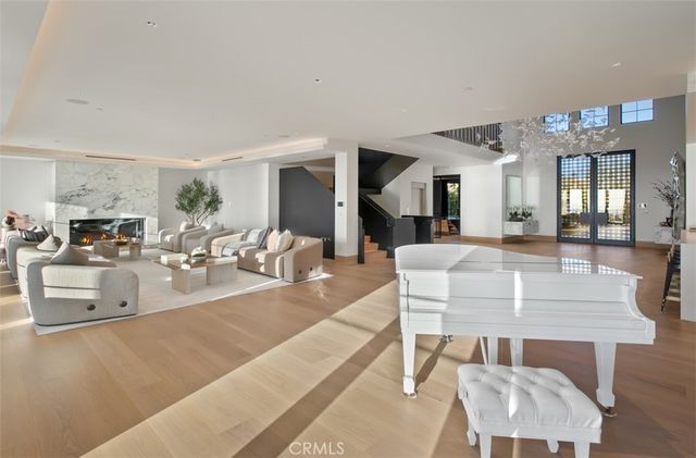 a view of kitchen with cabinets table and chairs
