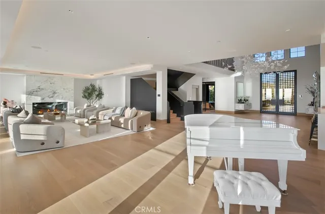 a view of kitchen with cabinets table and chairs