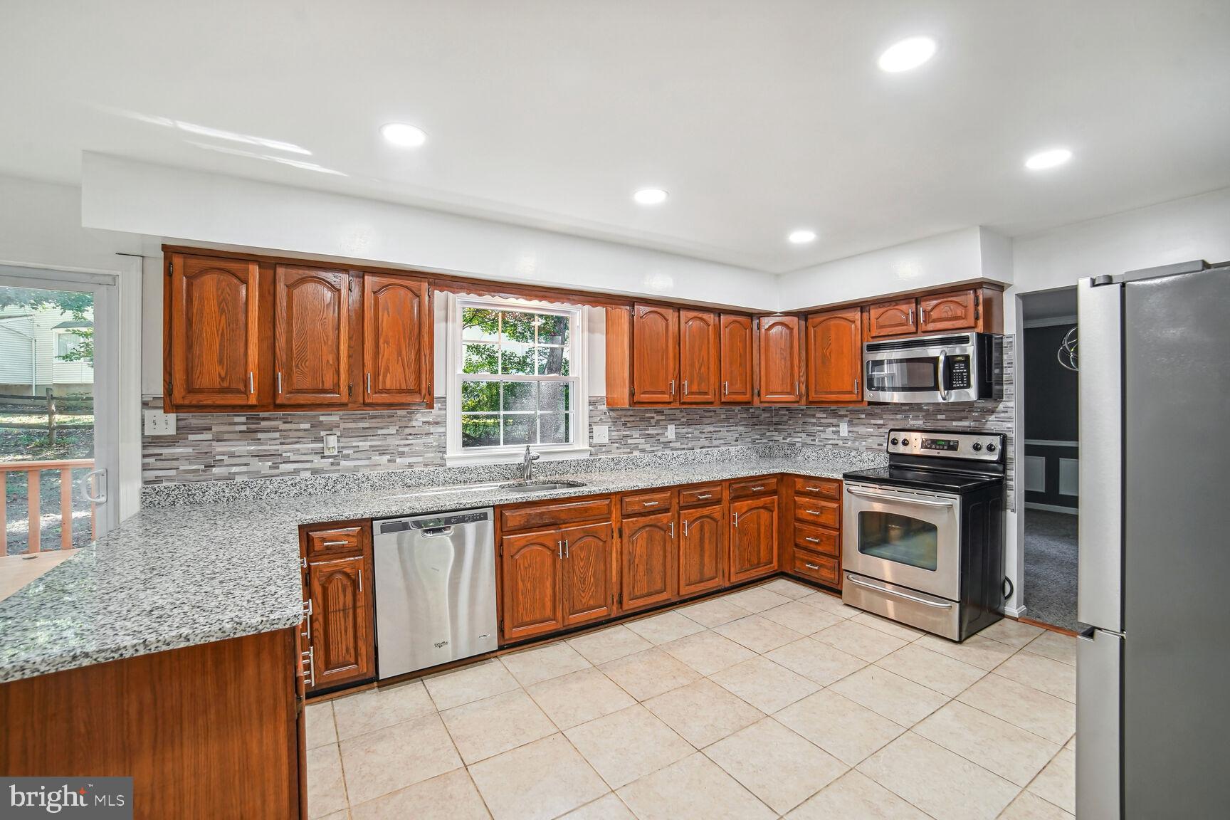 15519 Langside Street Silver Spring, MD 20905 - Photo 4 of 35 Kitchen with updated appliances