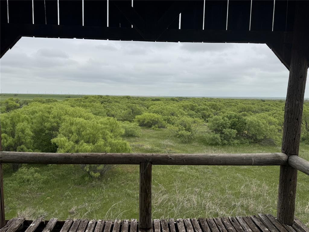 a view of a balcony with an outdoor space