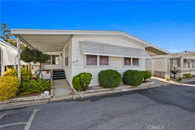 a view of a house with roof and windows
