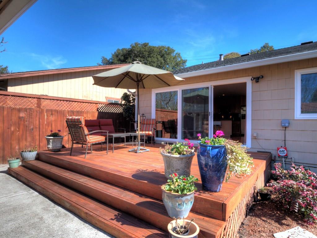 659 Marsh Road Menlo Park, CA 94025 - Photo 13 of 16 a view of a chairs and table in patio with a fire pit