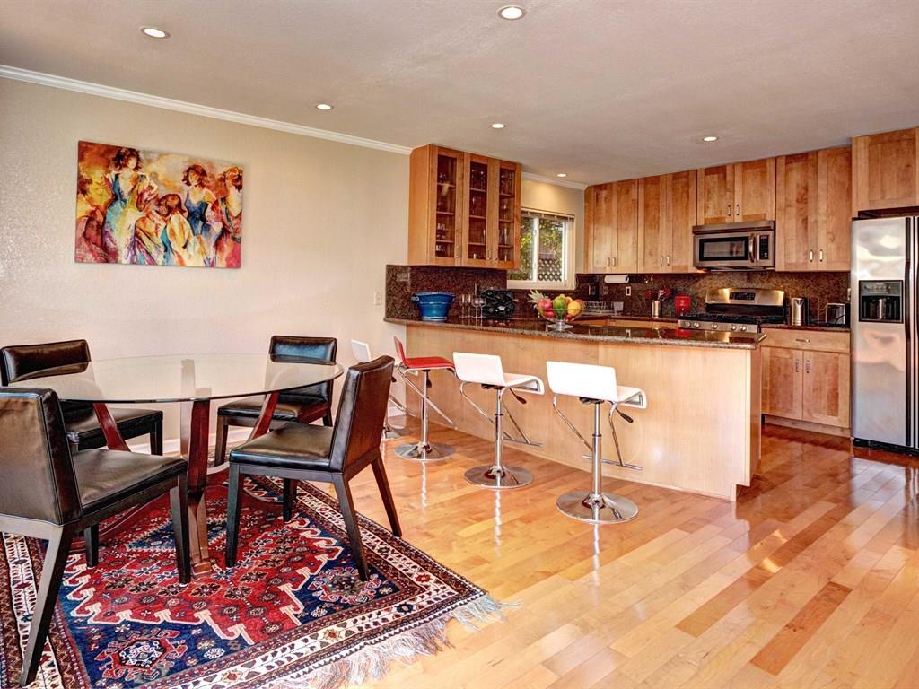 659 Marsh Road Menlo Park, CA 94025 - Photo 5 of 16 a living room with stainless steel appliances lots of furniture and kitchen view