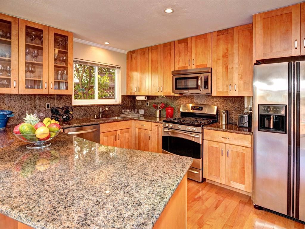 659 Marsh Road Menlo Park, CA 94025 - Photo 7 of 16 a kitchen with a sink stove and refrigerator