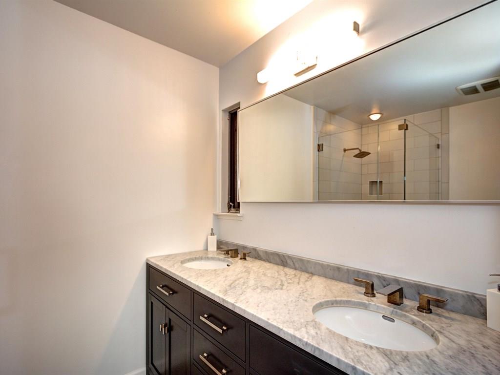 659 Marsh Road Menlo Park, CA 94025 - Photo 9 of 16 a bathroom with a granite countertop sink and a mirror