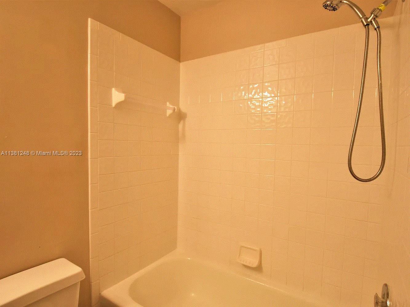 Silver Lakes Miramar, FL 33029 - Photo 13 of 17 a bathroom with a shower