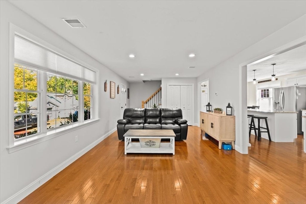 25 Upton Street Hanson, MA 02341 - Photo 14 of 30 a living room with furniture and a large window